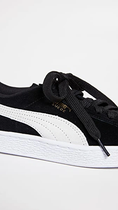 Shop Puma Suede Classic Sneakers In Black