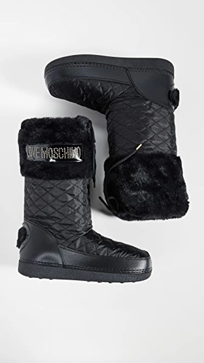 Shop Moschino Snow Boots In Nero