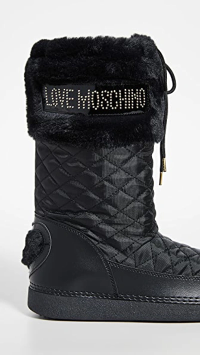 Shop Moschino Snow Boots In Nero