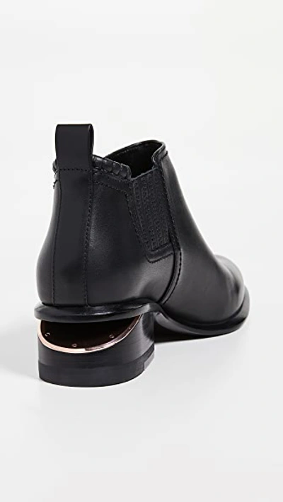 Shop Alexander Wang Kori Ankle Booties In Black/rose Gold