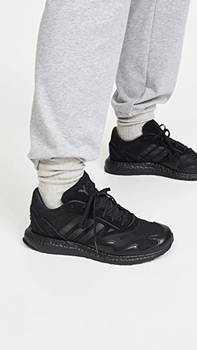 Shop Y-3 Rhisu Run Sneakers In Black/black/black