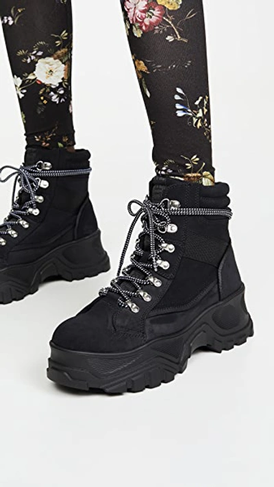 Shop Buffalo Fendo Lace Up Boots In Black