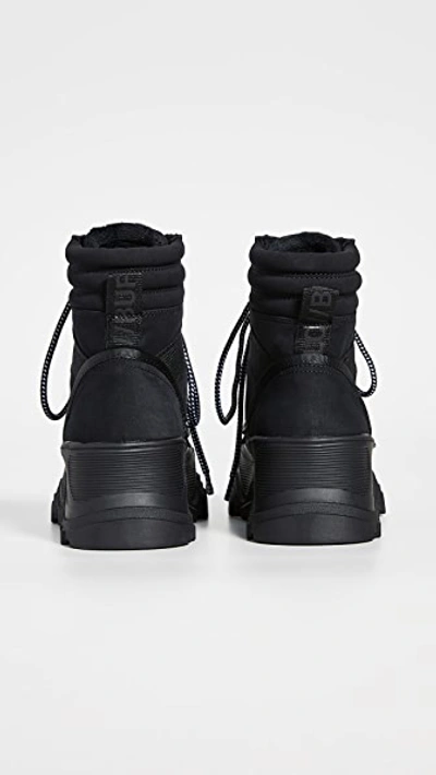 Shop Buffalo Fendo Lace Up Boots In Black