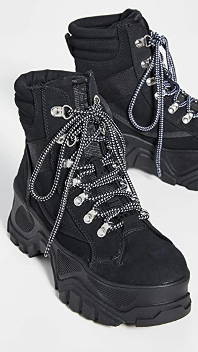 Shop Buffalo Fendo Lace Up Boots In Black