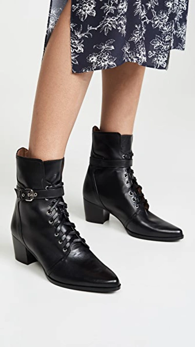 Shop Tabitha Simmons Porter Boots In Black