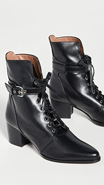 Shop Tabitha Simmons Porter Boots In Black