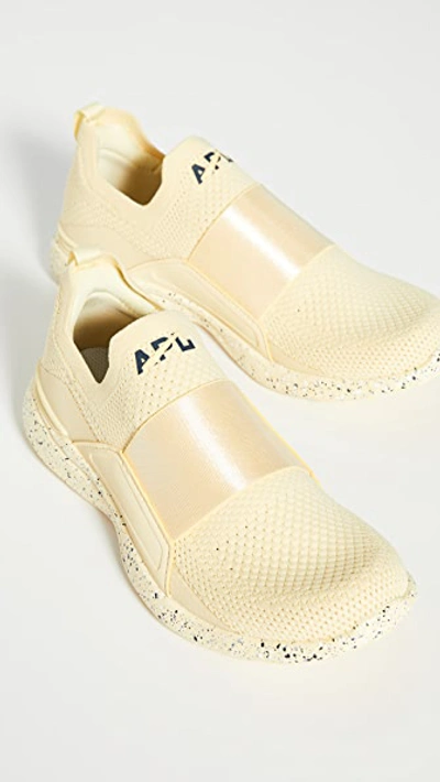 Shop Apl Athletic Propulsion Labs Techloom Bliss Sneakers In Lemon Zest/navy/white