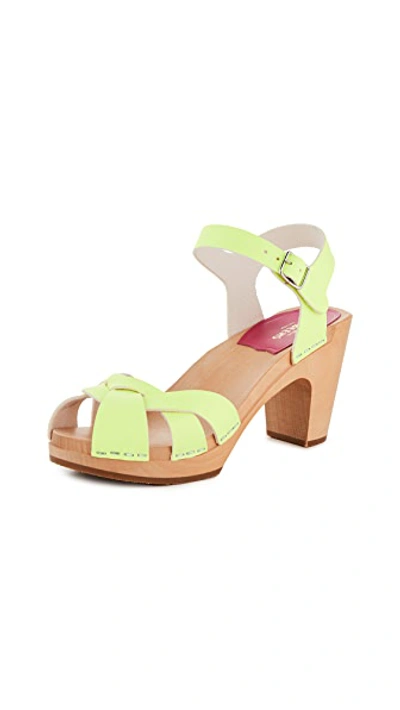 Shop Swedish Hasbeens Kringlan Clogs In Neon Yellow