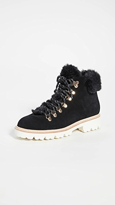 Shop Kate Spade Aspen Combat Boots In Black