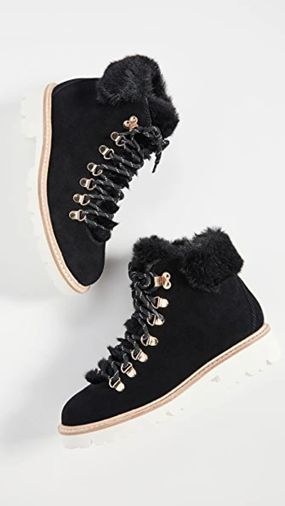 Shop Kate Spade Aspen Combat Boots In Black