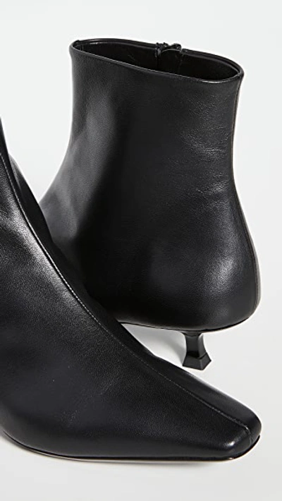 Shop By Far Laura Booties In Black