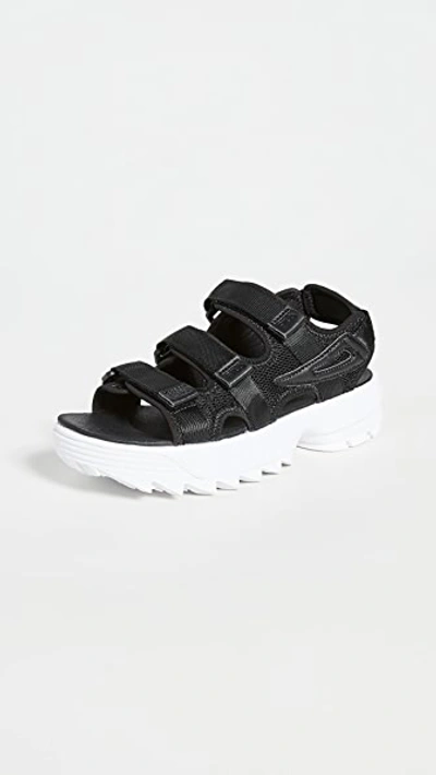 Shop Fila Disruptor Sandals In Black/black/white