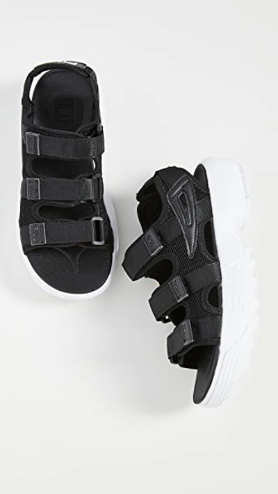 Shop Fila Disruptor Sandals In Black/black/white