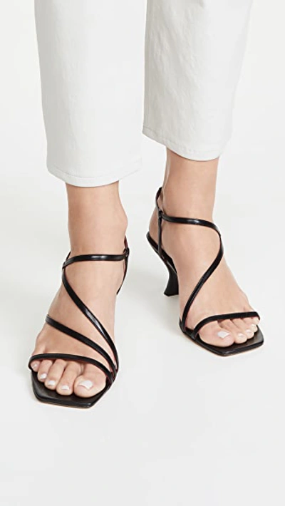 Shop Staud Gita Sandals In Black