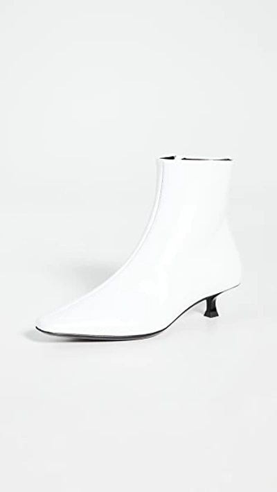 Shop By Far Laura Booties In White