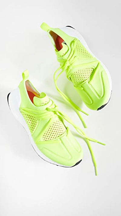 Shop Adidas By Stella Mccartney Ultraboost T.s. Neon Sneakers In Solar Yellow/cream White/white