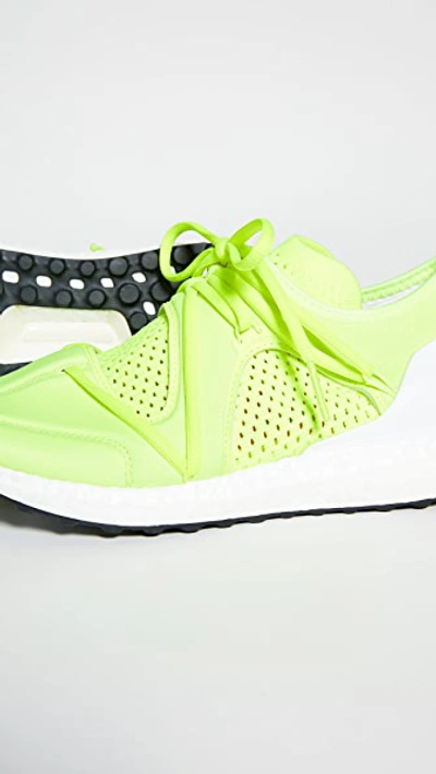 Shop Adidas By Stella Mccartney Ultraboost T.s. Neon Sneakers In Solar Yellow/cream White/white