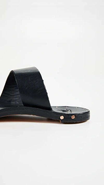 Shop Beek Finch Toe Ring Slides In Black/black
