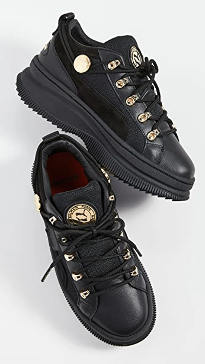 Shop Puma X Balmain Deva Low Sneakers In Black