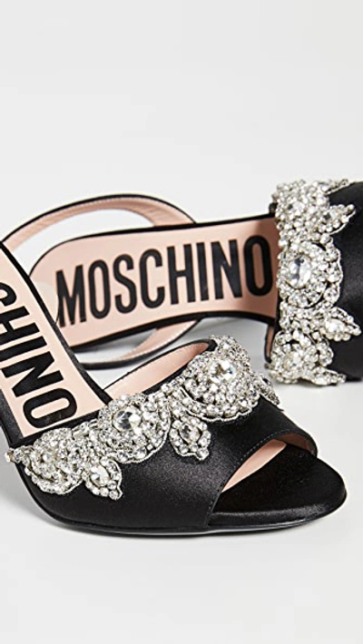 Shop Moschino Stone Embellished Sandals In Black