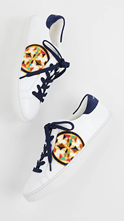 Shop Tory Burch T-logo Fil Coupe Sneakers In White/royal Navy/multi