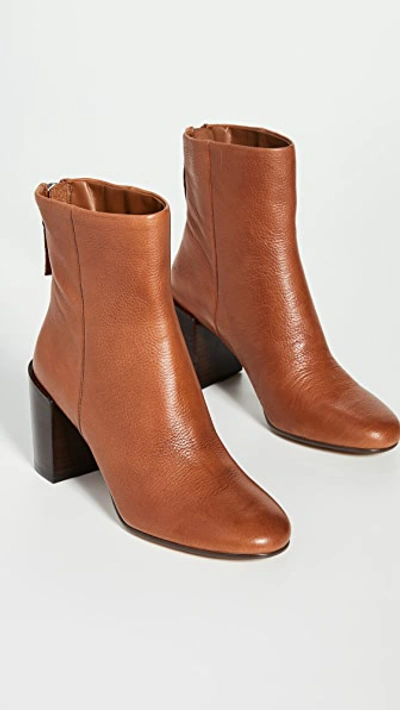 Shop Dolce Vita Cyan Block Heel Booties In Cognac