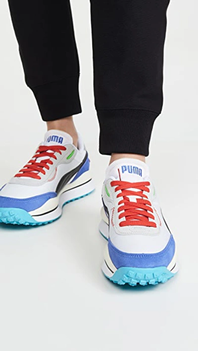 Shop Puma Rider 020 Ride On Sneakers In  White/dazzle/blue High Ri