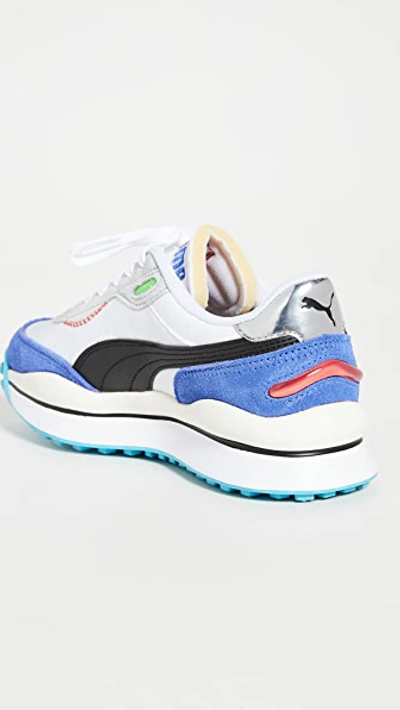 Shop Puma Rider 020 Ride On Sneakers In  White/dazzle/blue High Ri