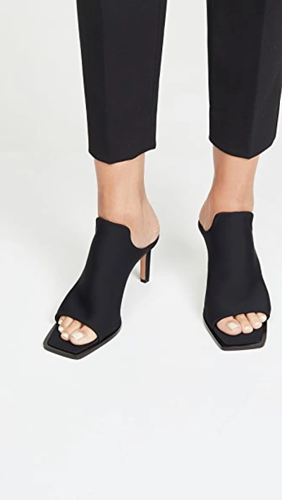 Shop Tibi Andre Lycra Mules In Black