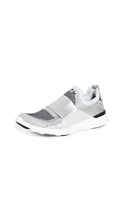 Shop Apl Athletic Propulsion Labs Techloom Bliss Sneakers In Metallic Silver/white/black