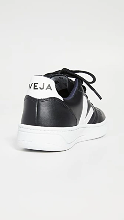 Shop Veja V-10 Sneakers In Black/white