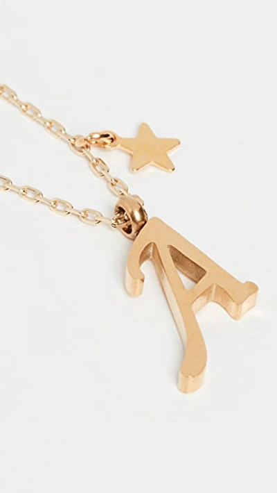 Shop Shashi Letter Pendant With Star Charm In A