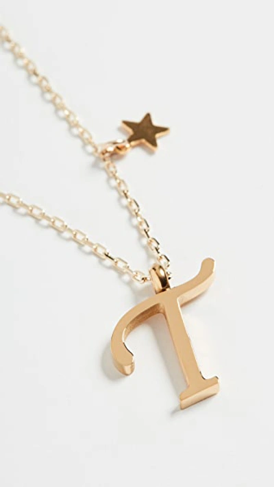 Shop Shashi Letter Pendant With Star Charm In T