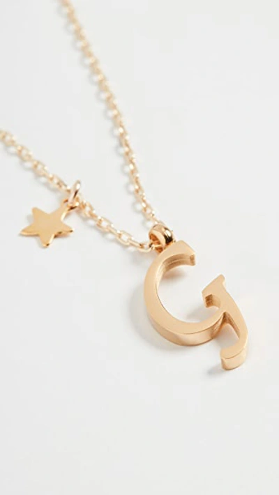 Shop Shashi Letter Pendant With Star Charm In G