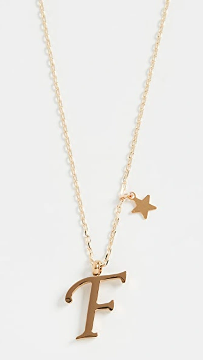 Shop Shashi Letter Pendant With Star Charm In F