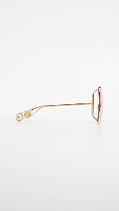 Shop Gucci Cruise Snake Sunglasses In Gold/light Pink