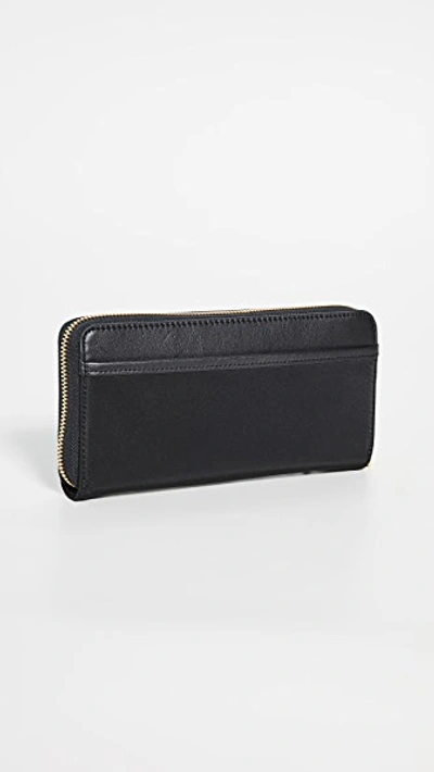 Shop Tumi Zip-around Continental Wallet In Black