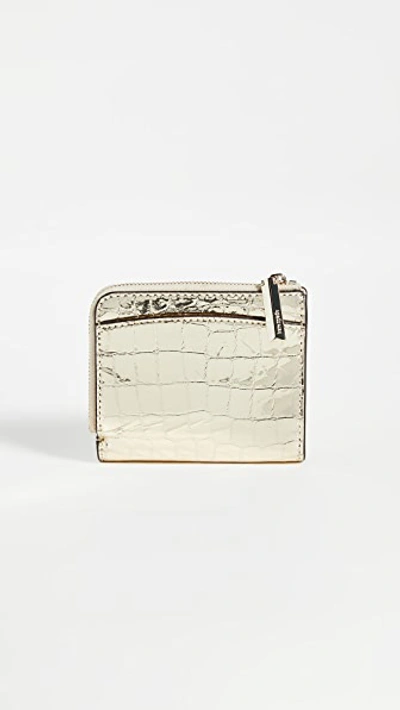 Shop Kate Spade Sylvia Croc Embossed Small Bifold Wallet In Gold