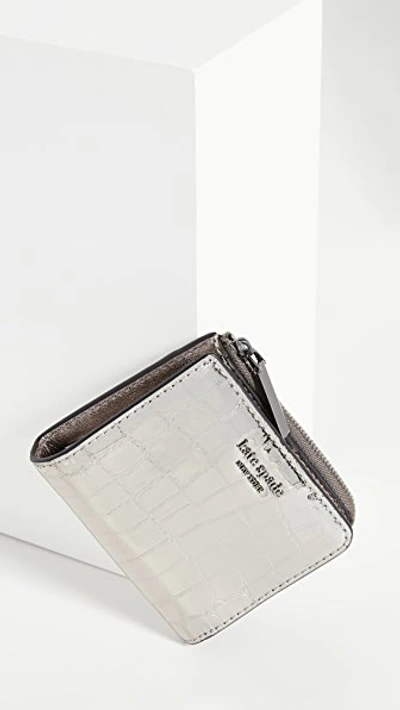 Shop Kate Spade Sylvia Croc Embossed Small Bifold Wallet In Gunmetal