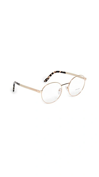 Shop Prada Round Metal Glasses In Pink