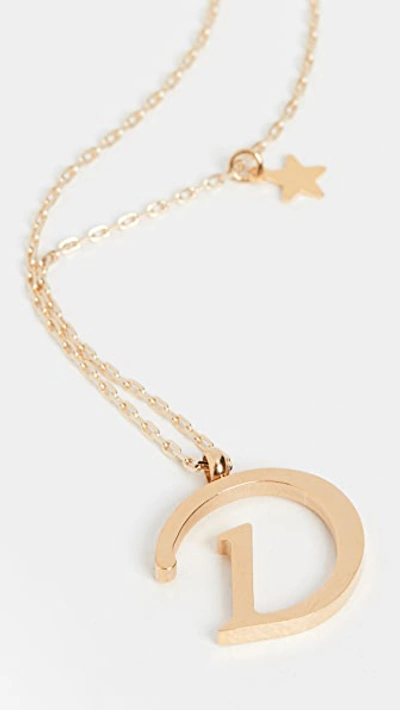 Shop Shashi Letter Pendant With Star Charm In D