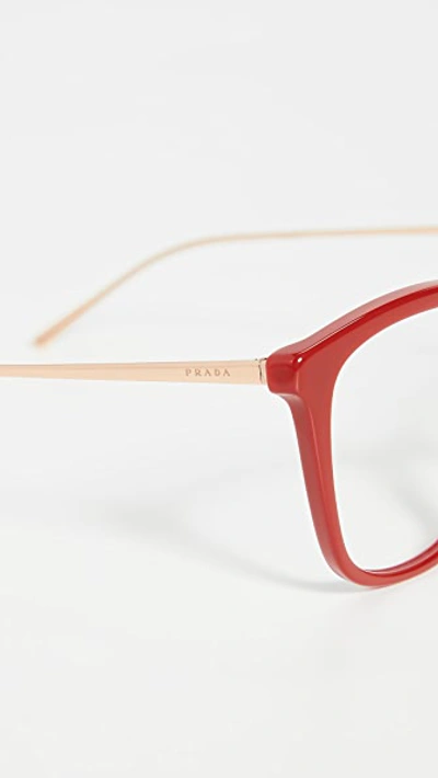Shop Prada Rounded Glasses In Purple Red