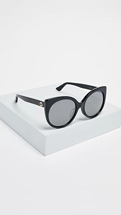 Shop Gucci Gg Cat Eye Sunglasses In Black/grey Mirror Gun