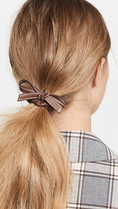 Shop Alexandre De Paris Leather Elastic Bow Hair Tie In Brown