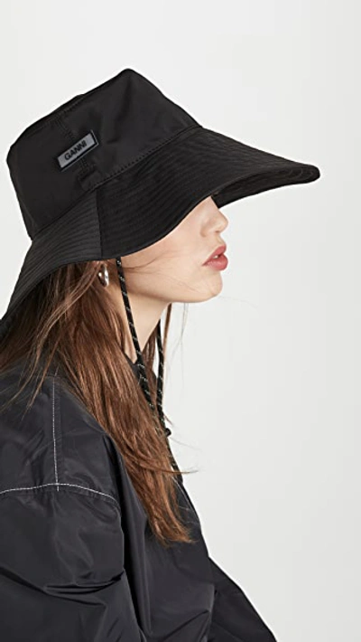 Shop Ganni Tech Fabric Hat In Black