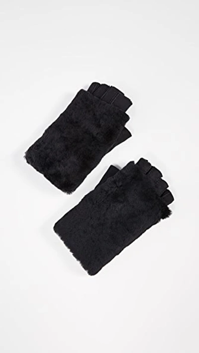 Shop Agnelle Bella Shearling Fingerless Gloves In Black