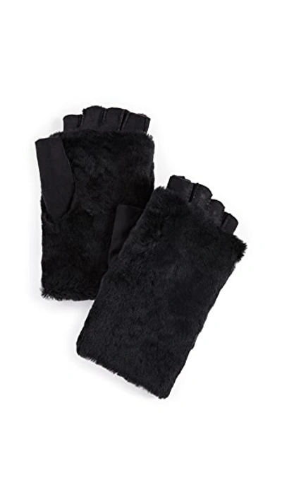 Shop Agnelle Bella Shearling Fingerless Gloves In Black