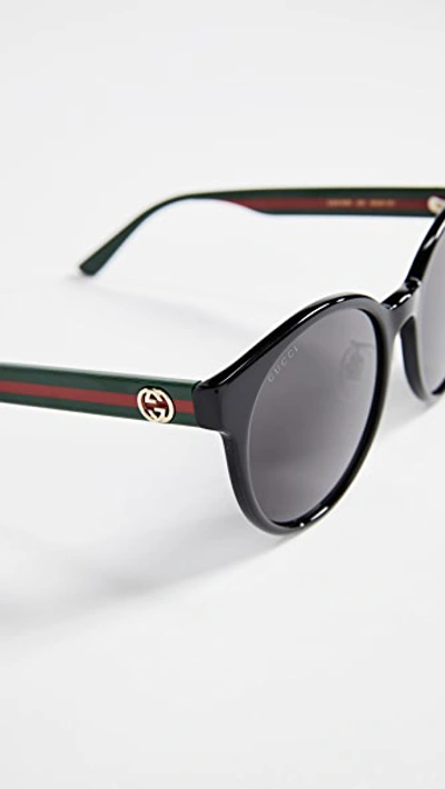 Shop Gucci Acetate Round Sunglasses In Black/green/red