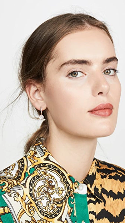 Shop Kate Spade Pave Huggie Earrings In Clear/gold