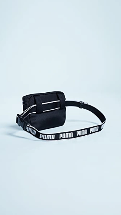 Shop Puma Gram Hip Sack In Black